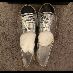 Chanel Silver leather espadrilles.